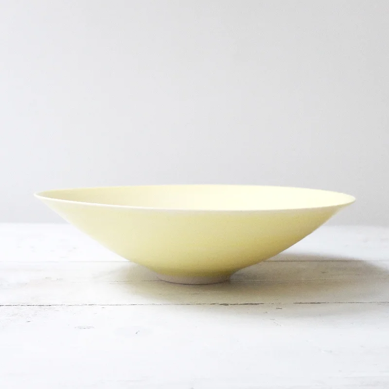 contemporary dinnerware for entertaining-Peter Wills Shallow Yellow Porcelain Bowl with Bronze Band